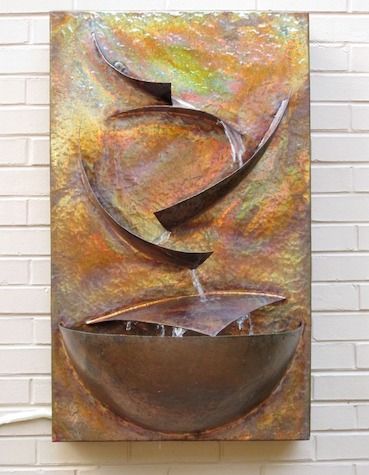 Copper wall-mounted water fountain